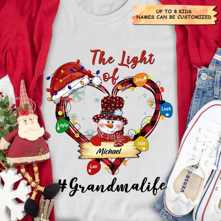 Personalized T-shirt - Gift For Grandma - The Light Of Grandma's Heart Christmas ARND037