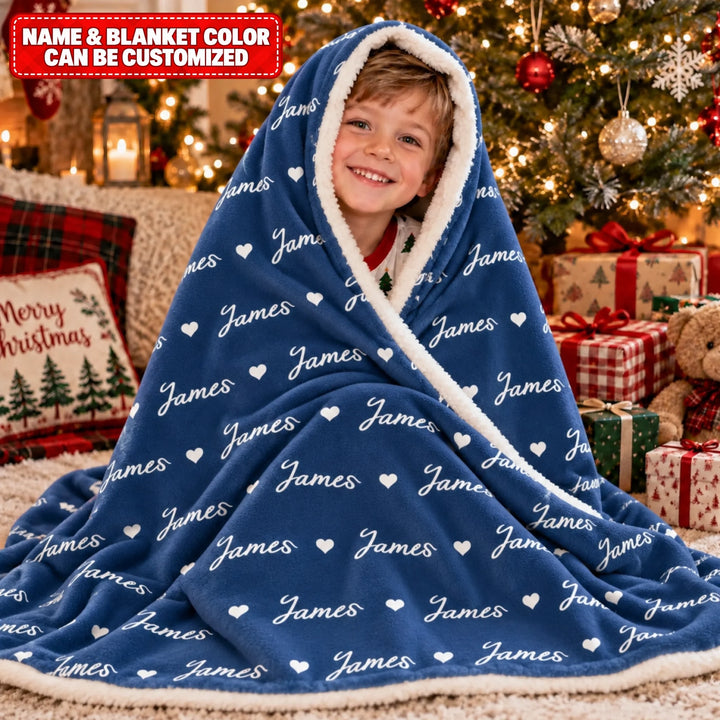 Cậu bé James trong chăn Noel ấm áp